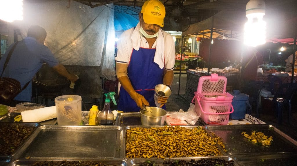 street seller at the night market in khanom 
