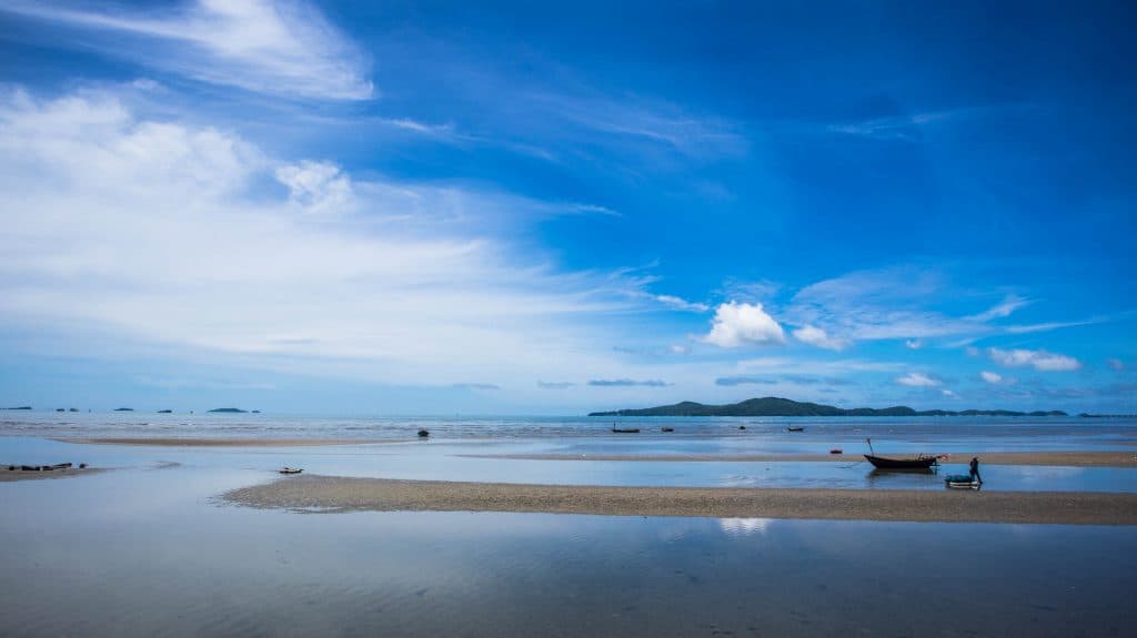 fishing boat in the horizon in rayong, thailand