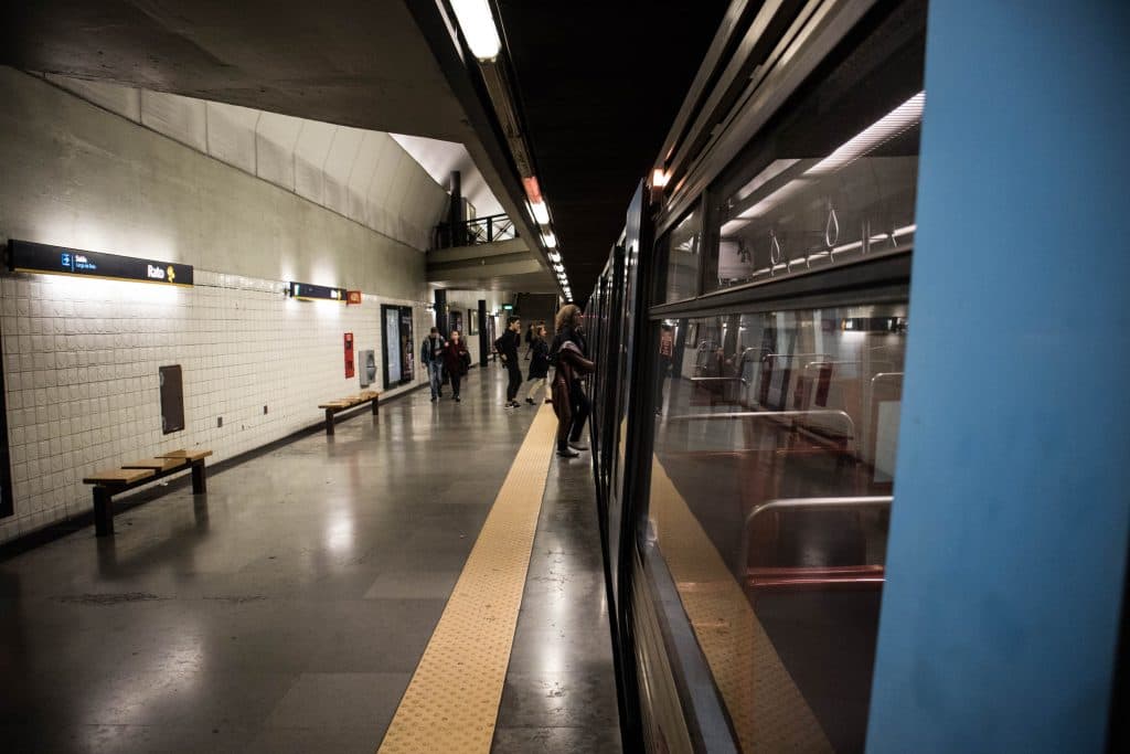 metro train in Lisbon people walking on the platform 