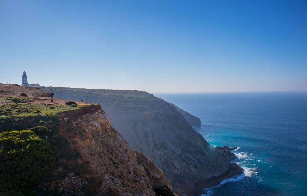 a trip outside of lisbon cabo espichel and the lighthouse on a cliff 