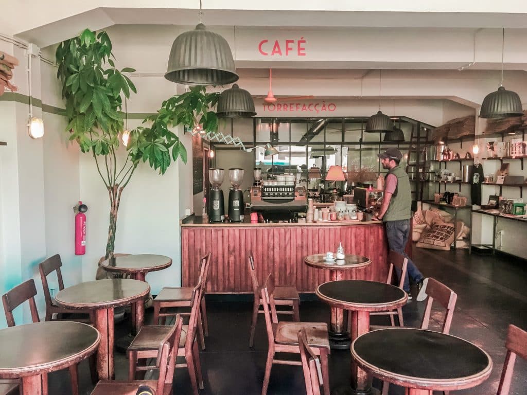Moving to Porto a cafe with pink chairs in Porto