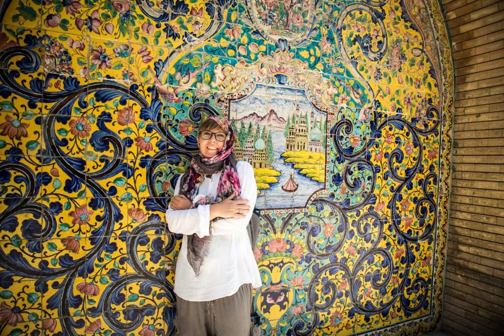 a smiling girl in golestan palace 