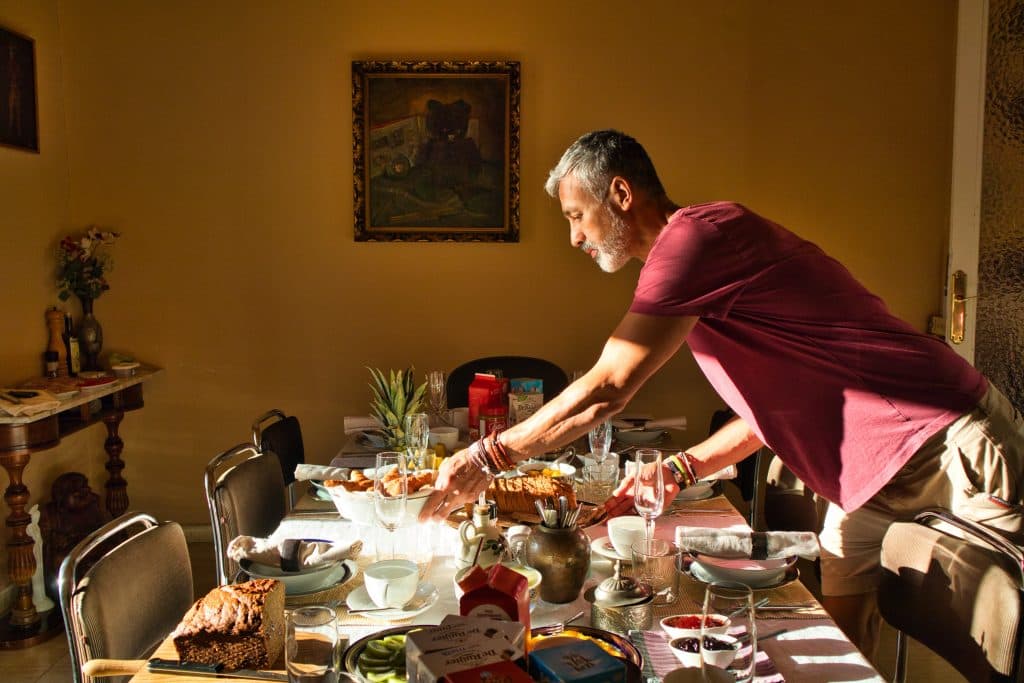 dany at valencia mindfulness retreat prepares breakfast for his guests