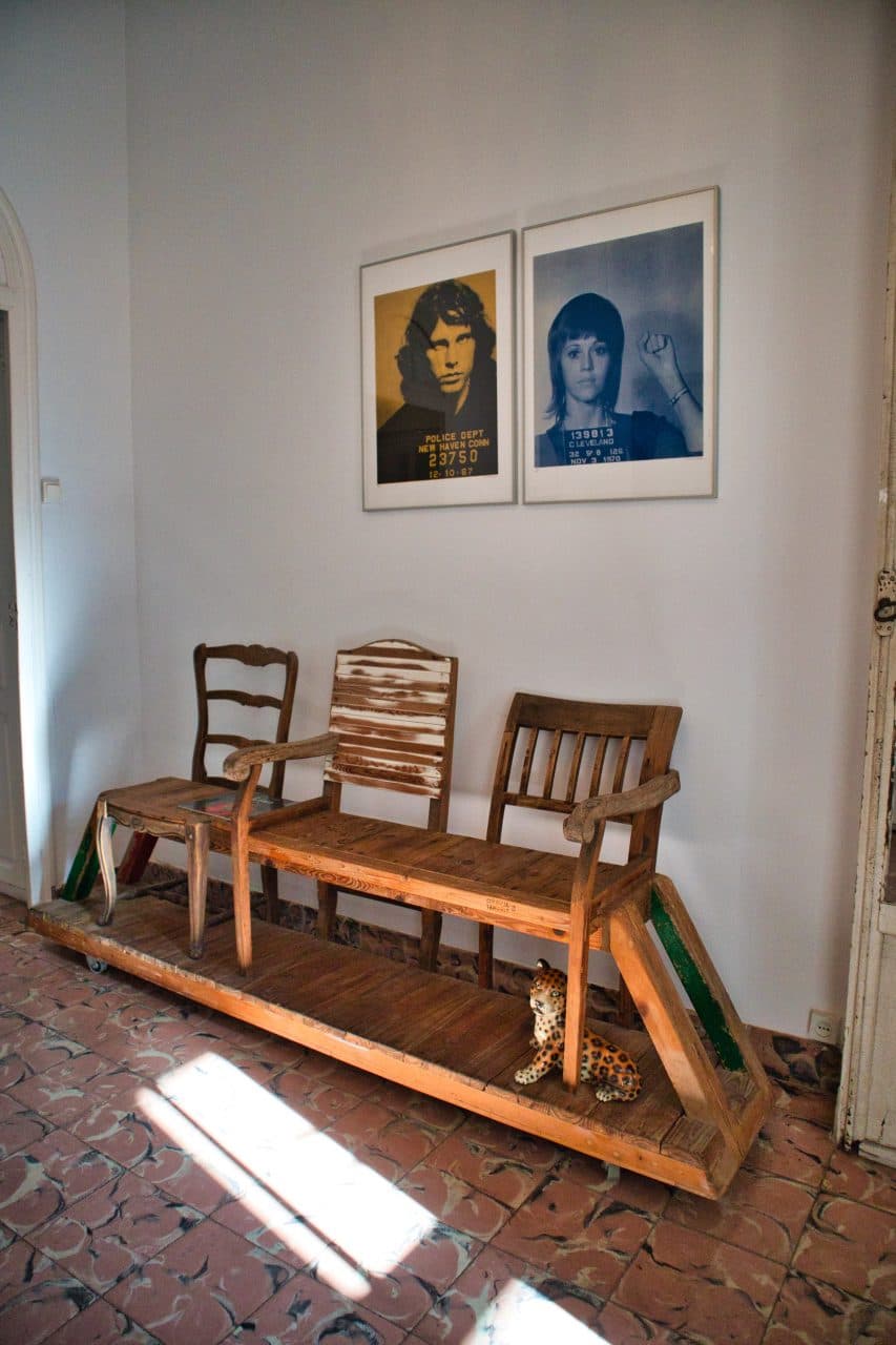 two posters above three chairs at valencia mindfulness retreat