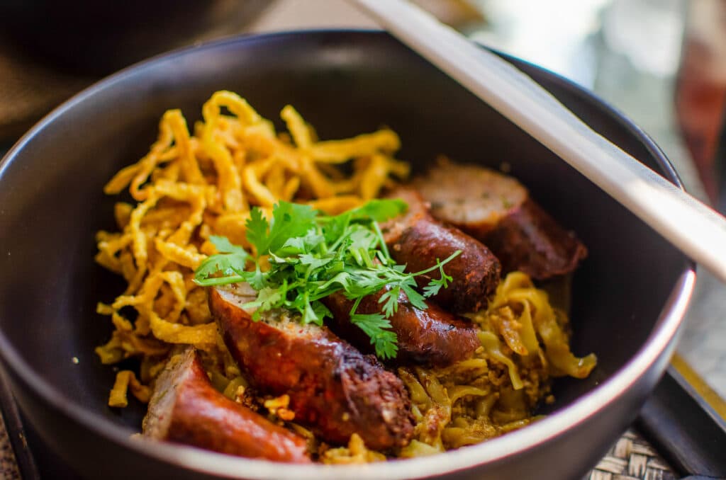 Thai sausage in a khao soi soup. 