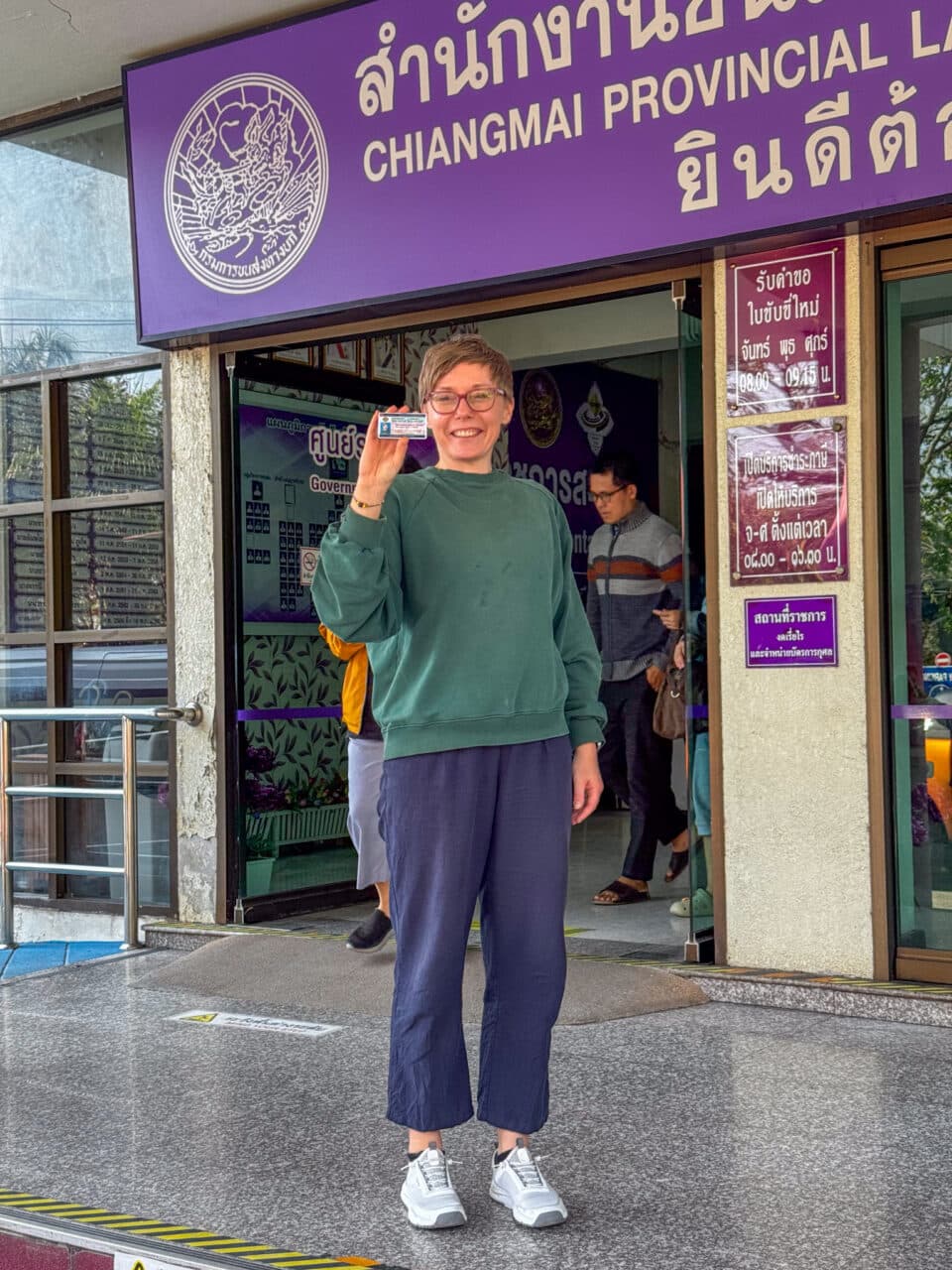 Joanna outside of the Land and Transportation office. 