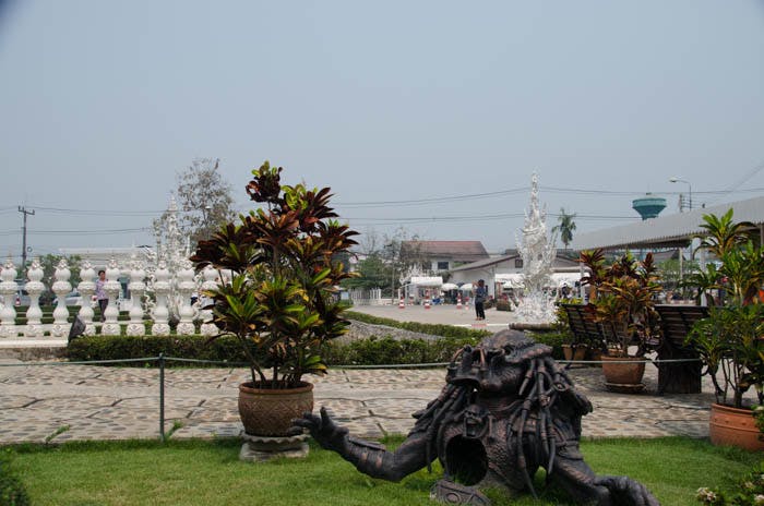 a big sculpture at the white temple in chiang rai 