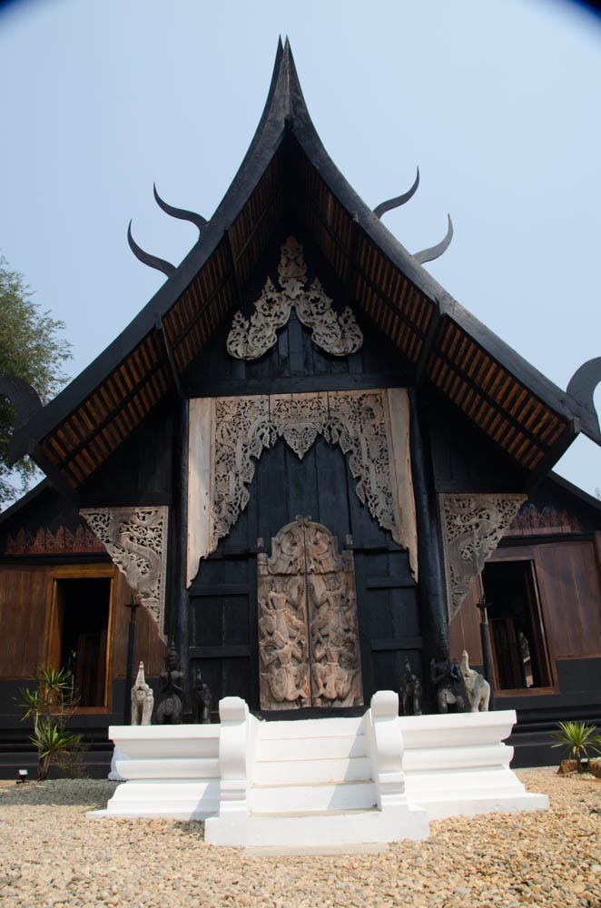 the black house in chiang rai seen from the outside