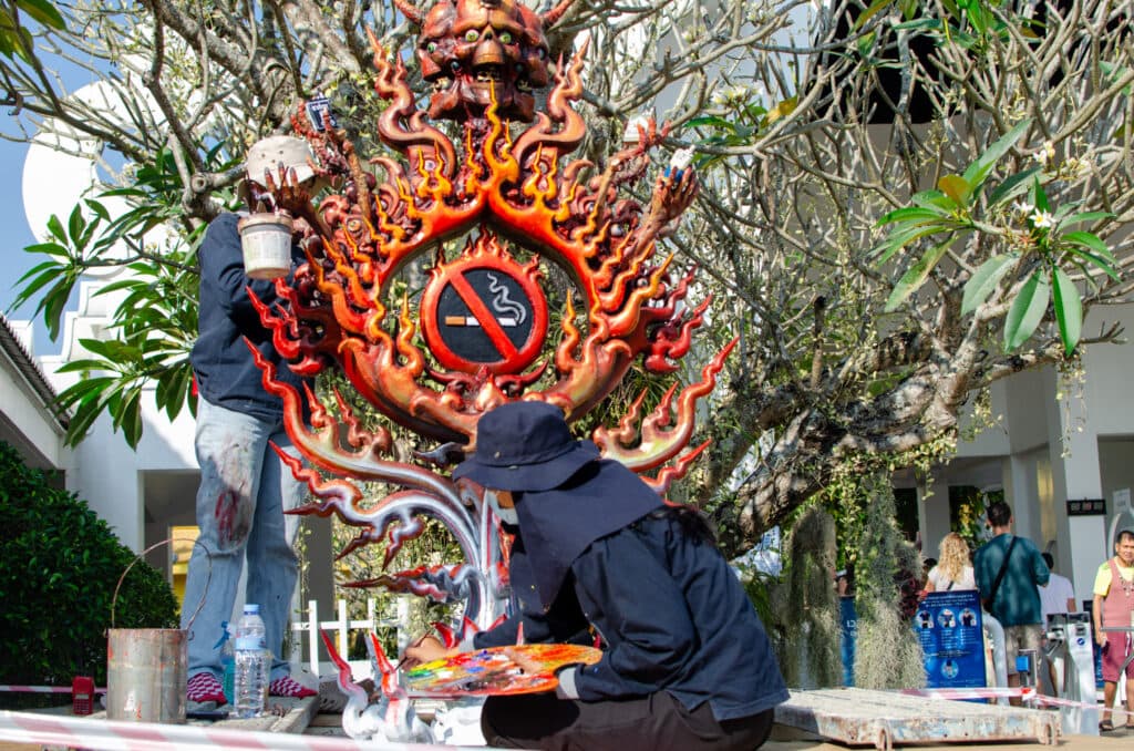 A no-smoking sign being made in Thailand.