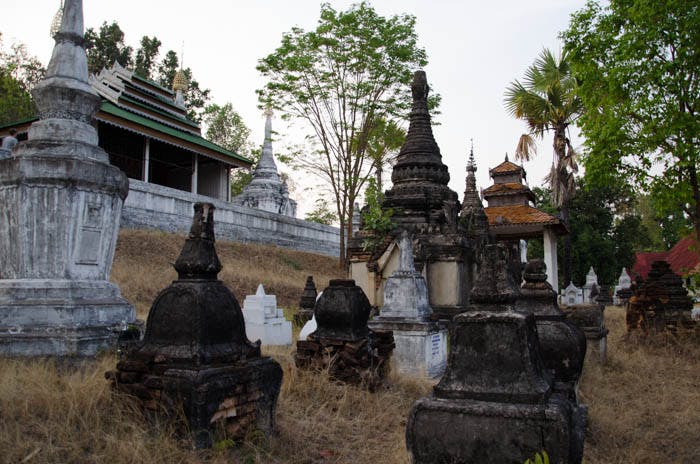 graves and stupas at a buddhist cemetery in mean hong song thailand