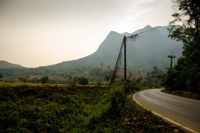a bend at the road in the mountains of chiang dao, thailand 