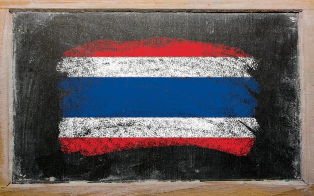 Chalky thailand flag painted with color chalk on old blackboard