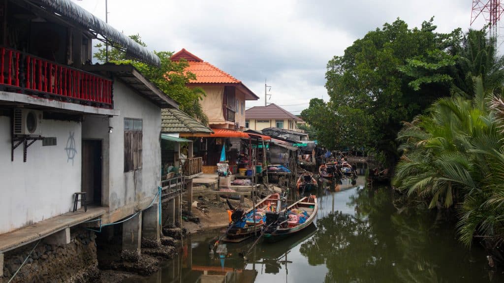 fishing boats seen from the bridge in khanom thailand