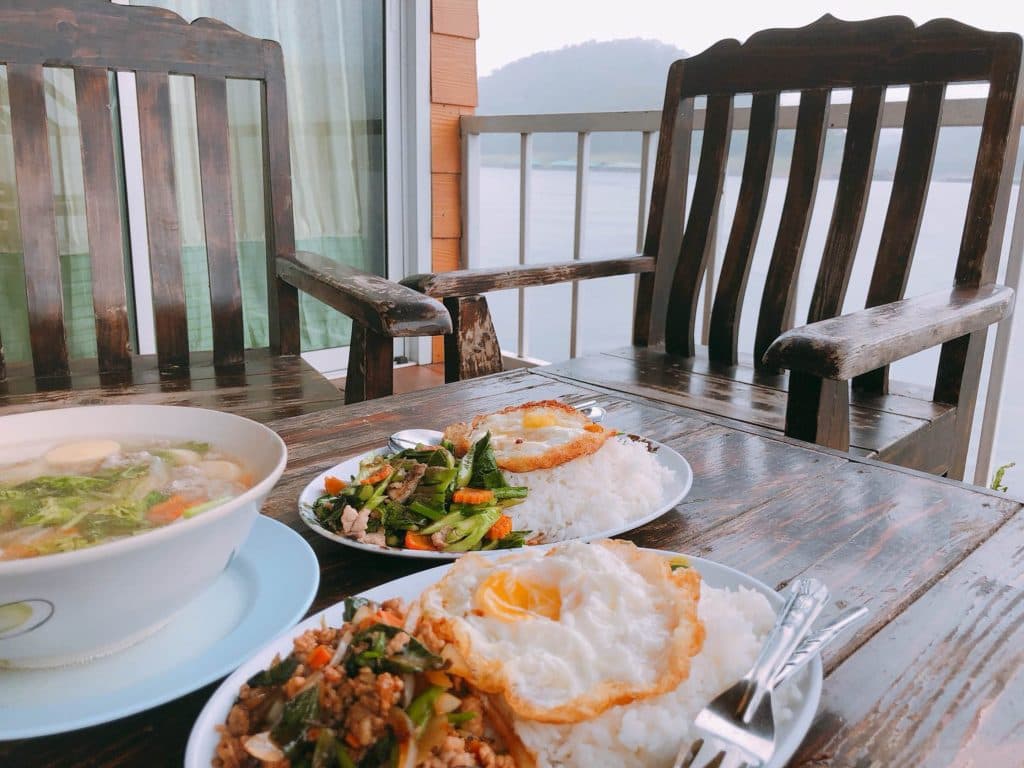rice with fried pork and soup with pork on mae ngat dam thailand