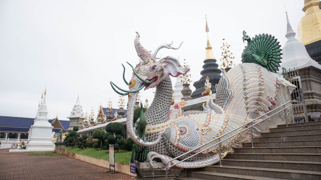 a dragon sculpture in blue temple 