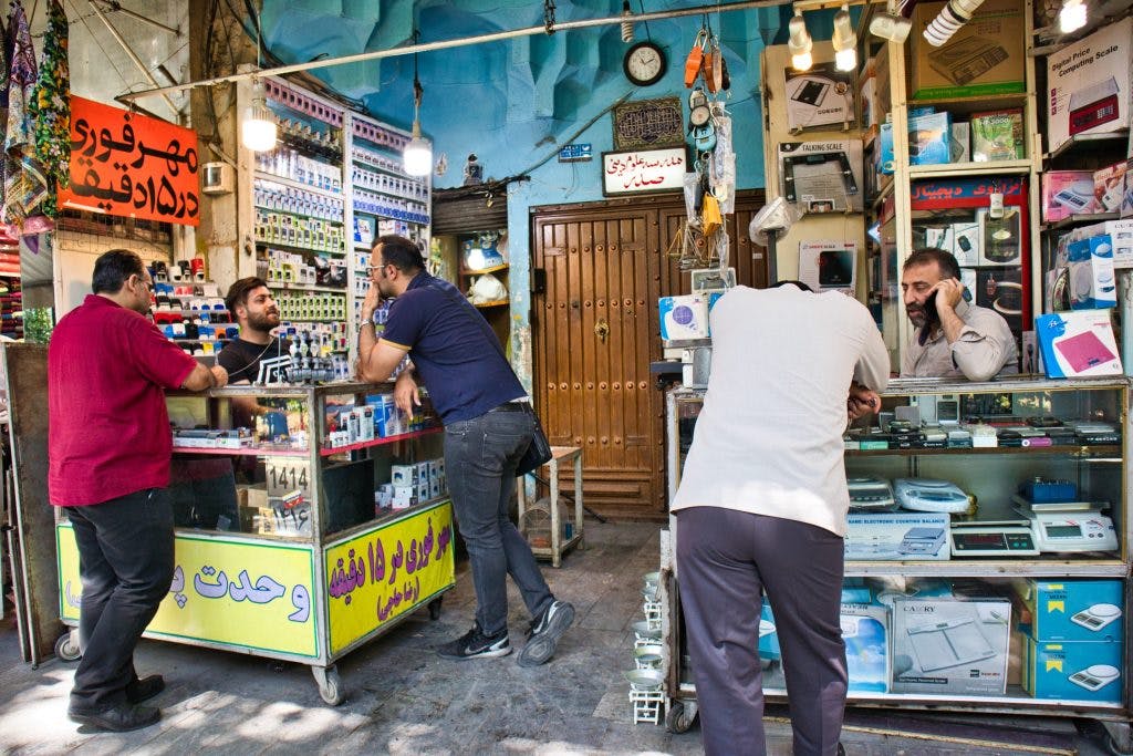 men selling phones and electronics at grand bazaar teheran