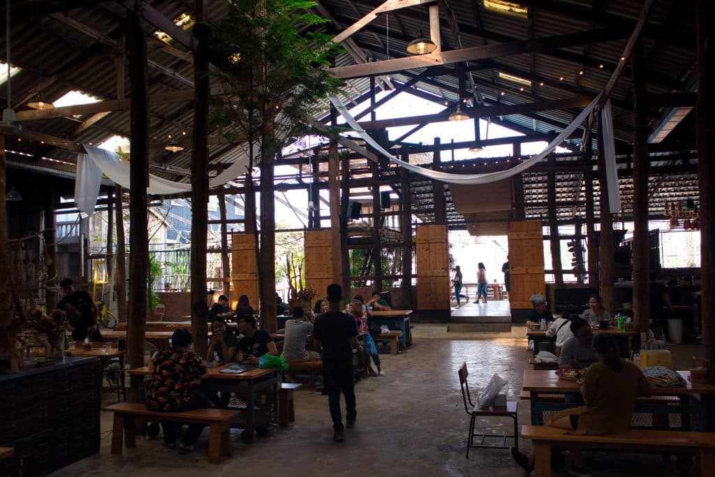 dark interior of a restaurant on koh kret, bangkok.
