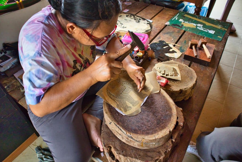 A woman making puppets at the puppet theatre in nakhon si thammarat