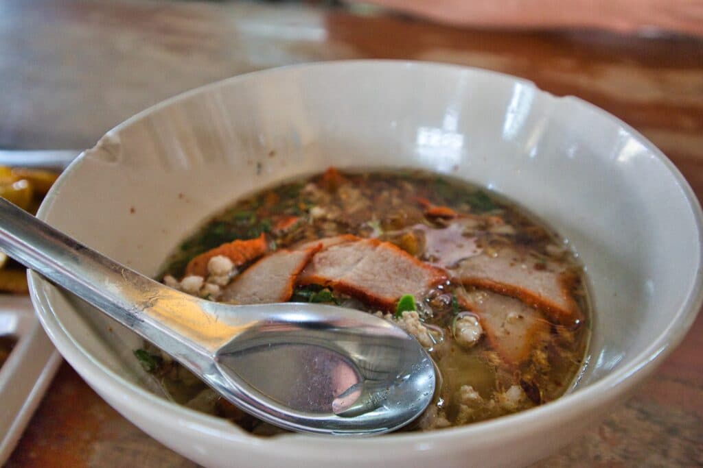 A bowl with sukothai noodles.