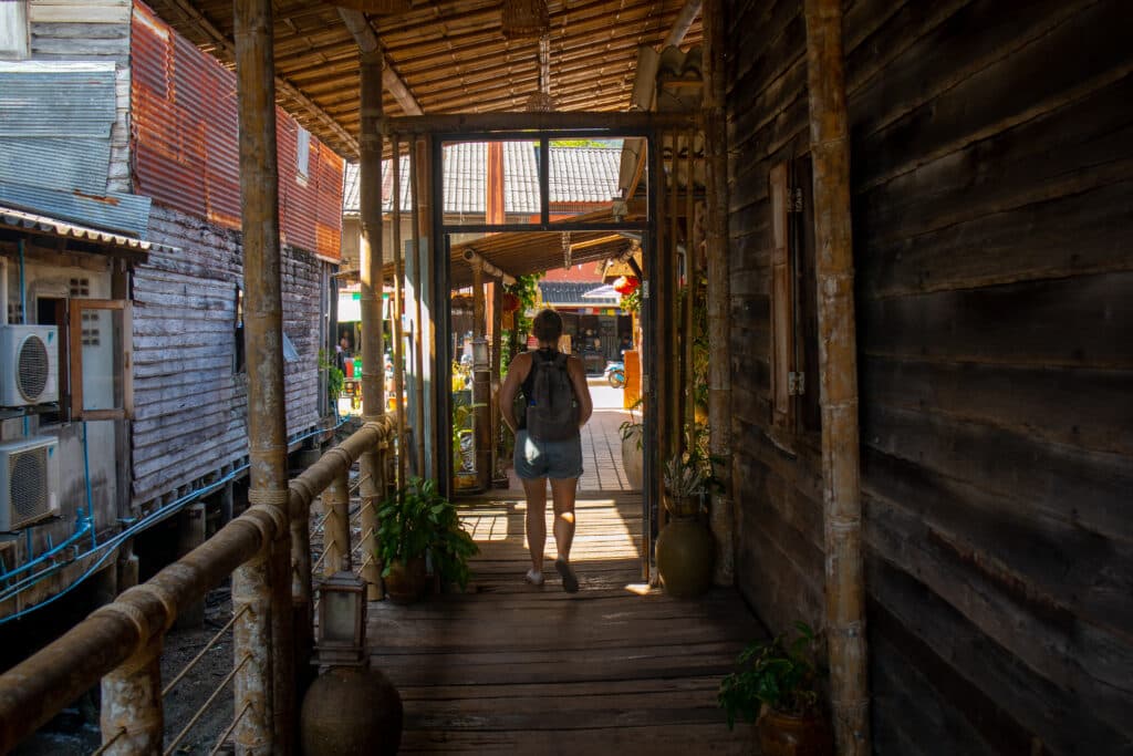 A woman walking on a street on koh lanta.