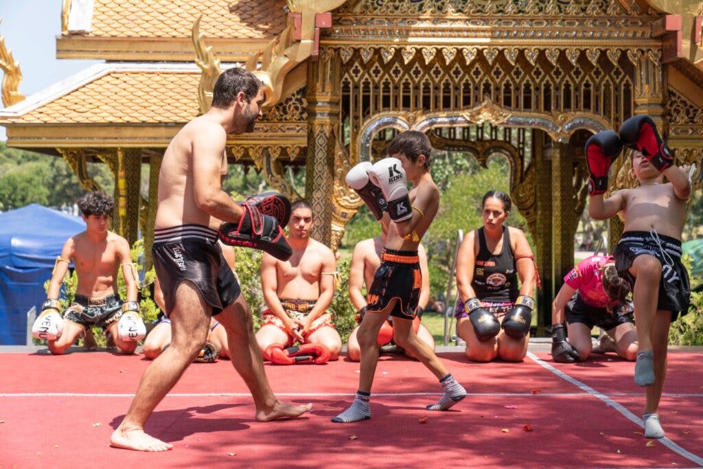 Muay Thai fighters show their skills on a stage at the thai festival in belem. 