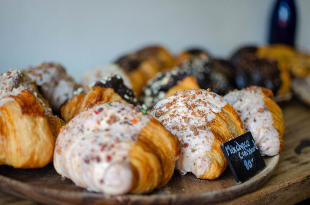 Croissants laying on a plate in a french bakery, koh tao, thailand.