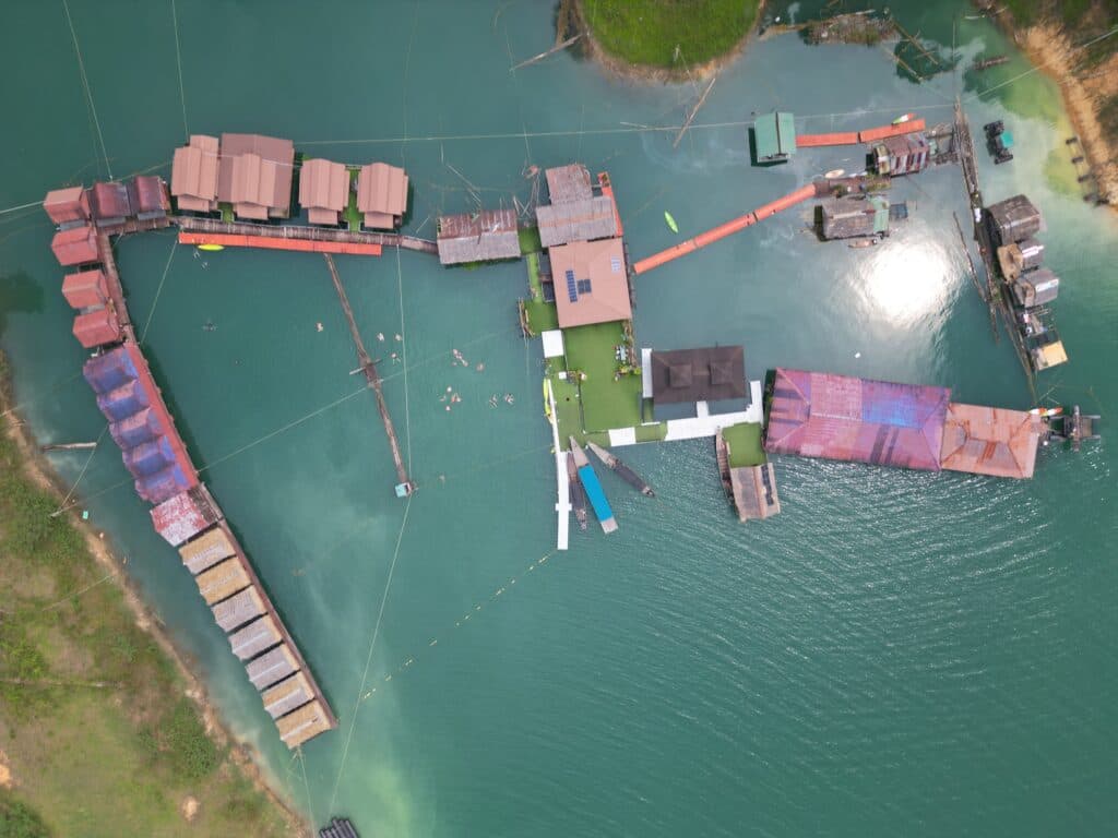 Floating houses on cheow lan lake seen from above.