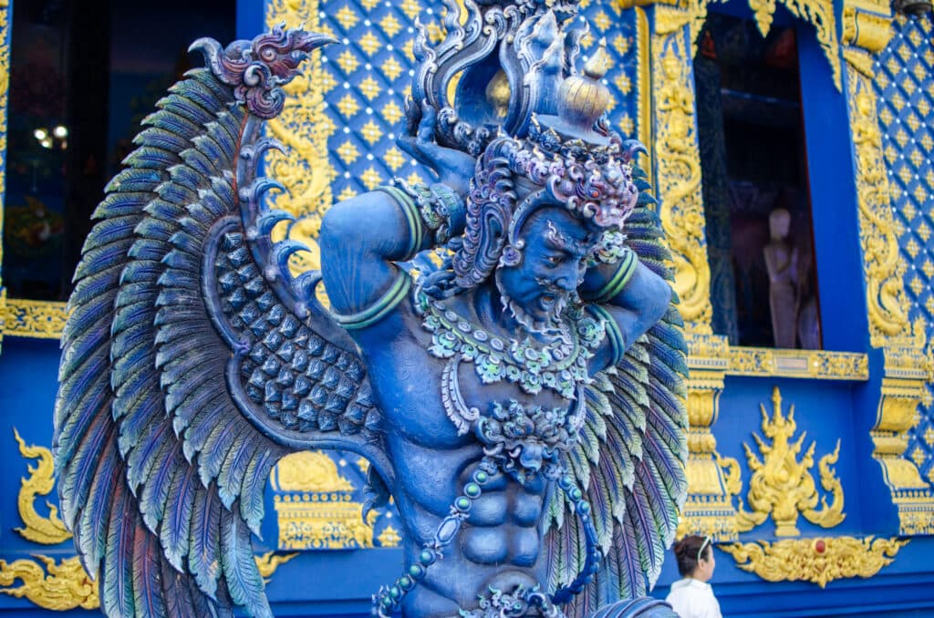 A blue statue of an angel
