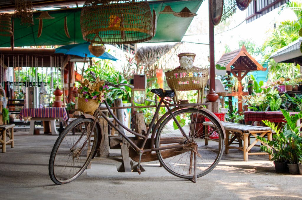 A bicycle in a garden in thailand