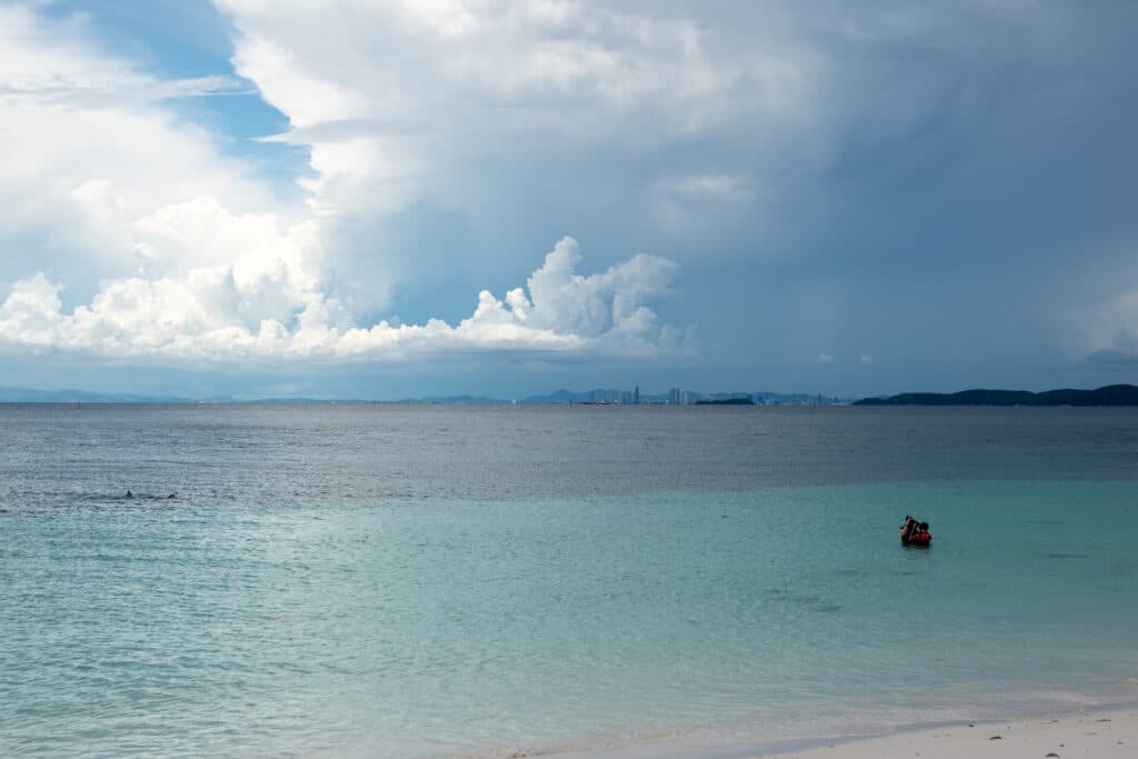 Pattaya catamaran cruise review, blue water, dark sky