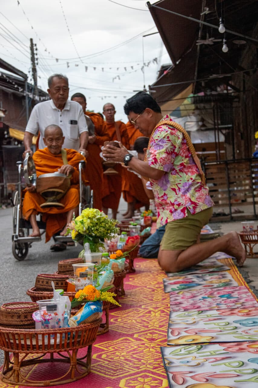 Chiang Khan, Thailand, monk offering