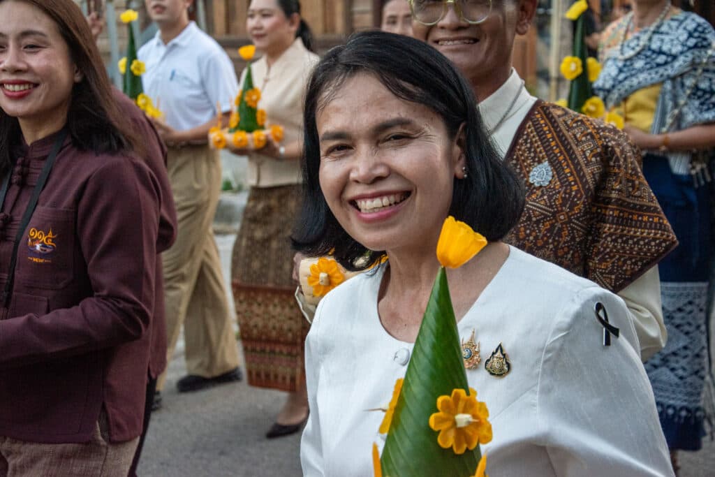 Chiang Khan, Thailand, traditional dress and flowers