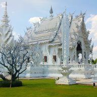a white temple in chiang rai seen from the outside