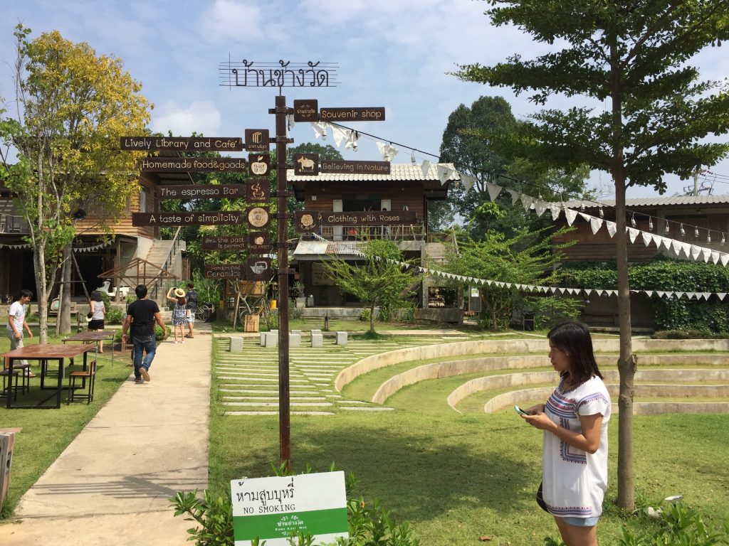 The main area with iconic bunting at Baan Kang Wat