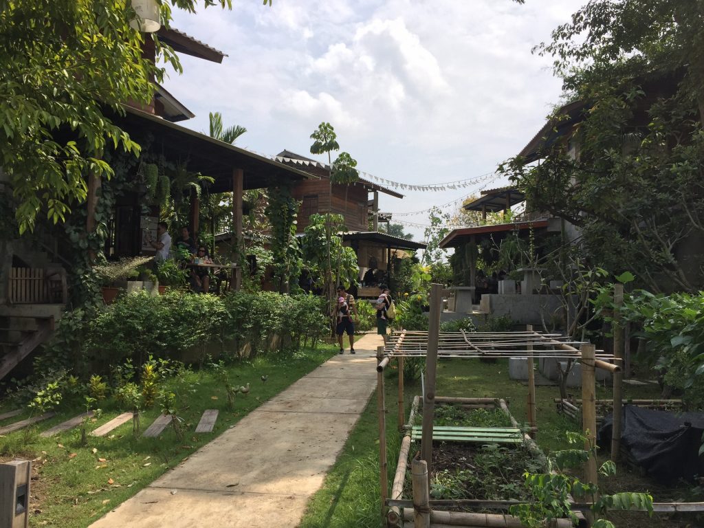 Lush, green gardens at Baan Kang Wat in Chiang Mai