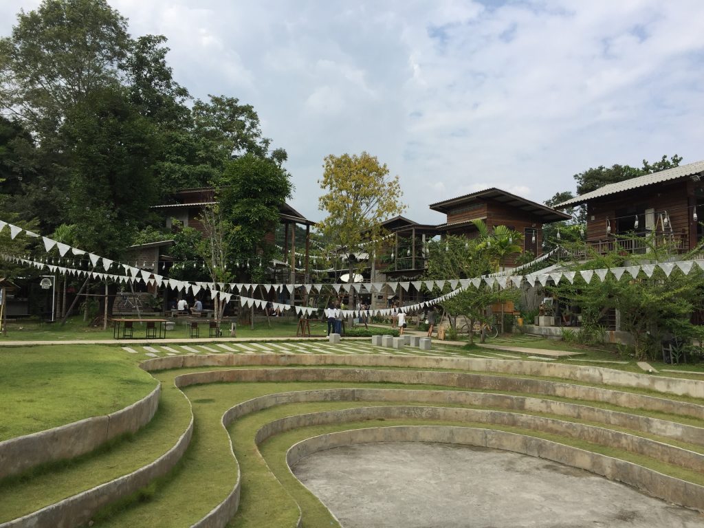 Garden with bunting at Baan Kang Wat Artist Village in Chiang Mai