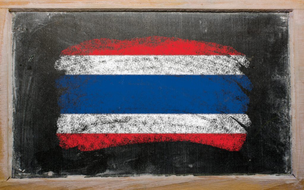 Chalky thailand flag painted with color chalk on old blackboard