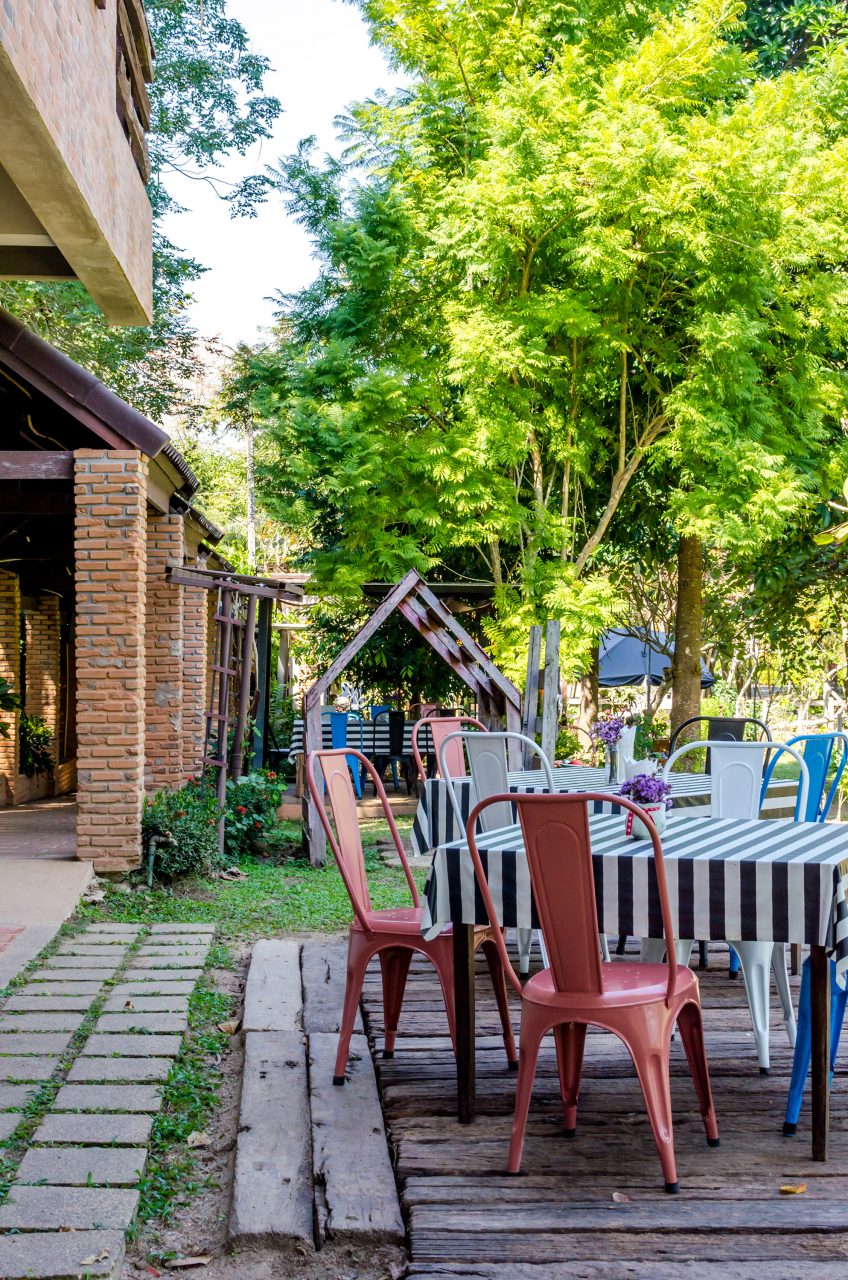 The beautiful garden of Baa Baa Black Café in Chiang Mai