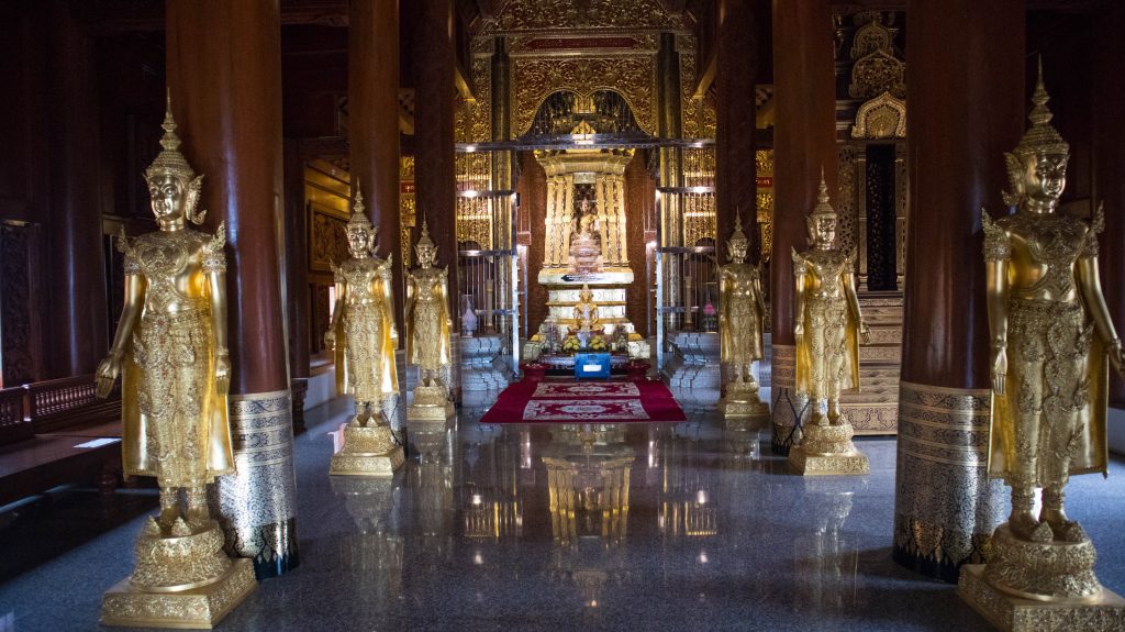 buddha statues in blue temple near chiang mai