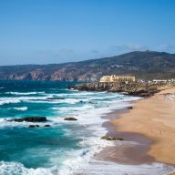 huge waves at the shore of guincho beach