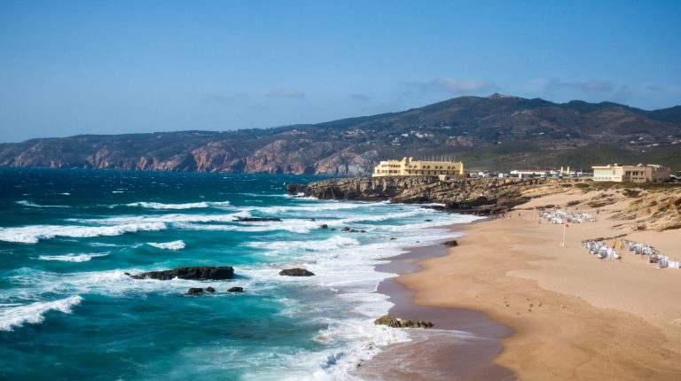 huge waves at the shore of guincho beach