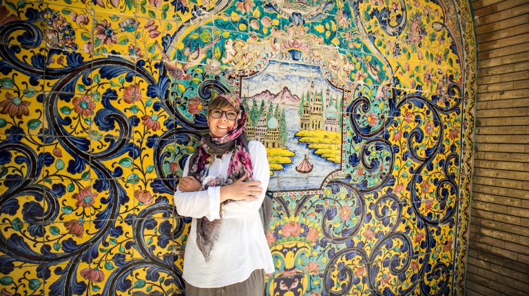 a smiling girl in golestan palace