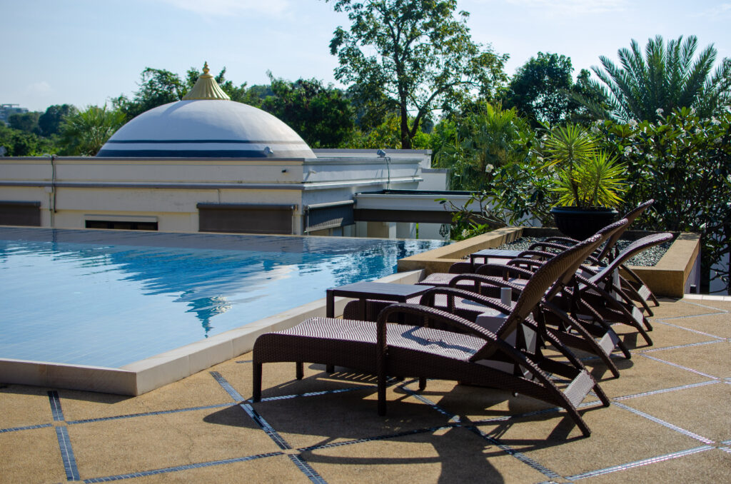 A beautiful pool and lounge chairs, absolute sanctuary, koh samui.